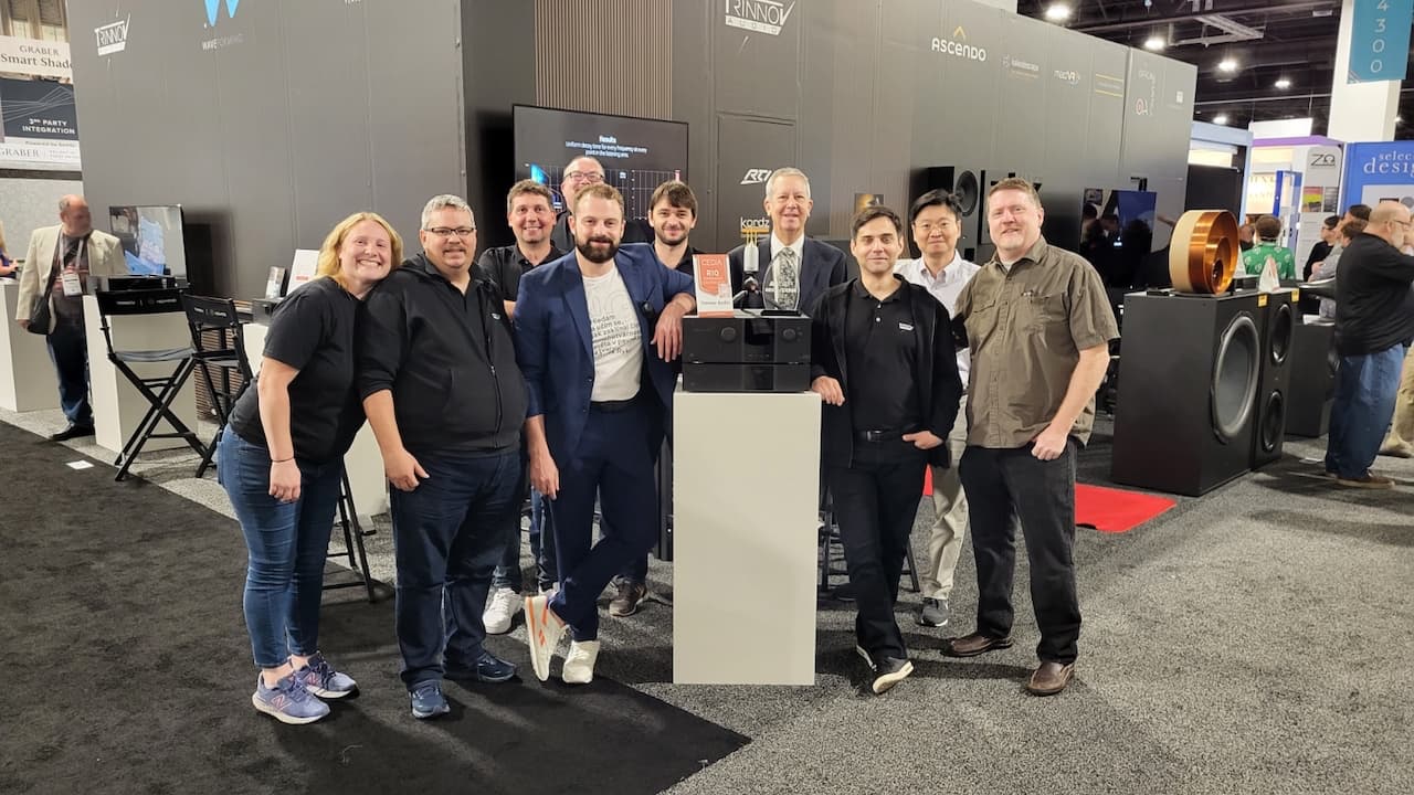 Chris Boylan with Trinnov team CEDIA 2023.jpg